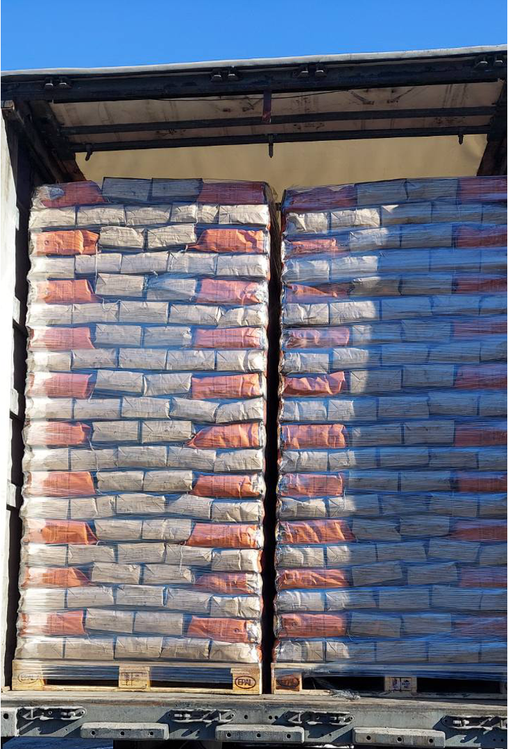 Pallet of charcoal bags fixed with stretch film